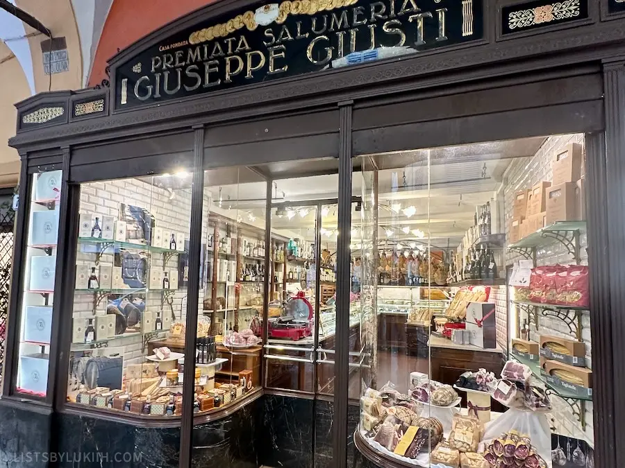 A shop selling jams, cured meat and cheese.