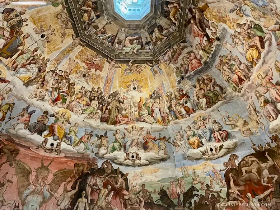 The interior of a dome decorated with Renaissance art.