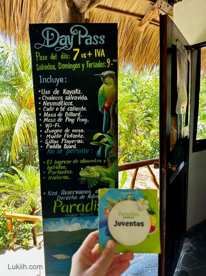 A sign that says "Day Pass" with a list of amenities.