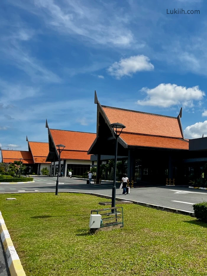 An open airport with unique orange roofs.