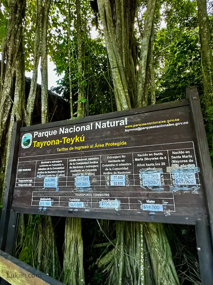 A sign that breaks down entrance fees for Parque Nacional Natural.