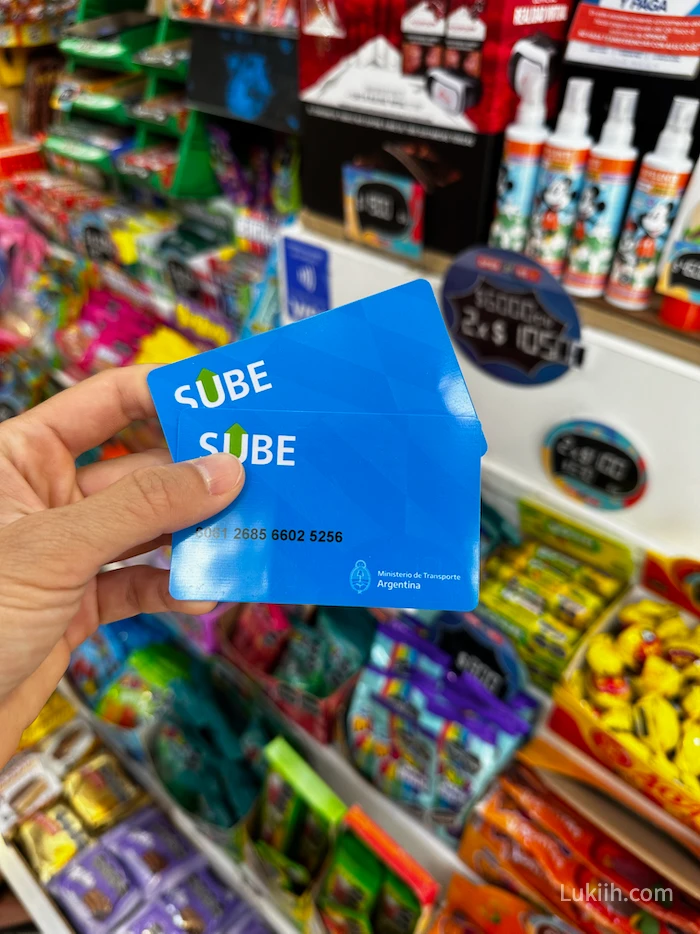 Two blue cards that say SUBE.