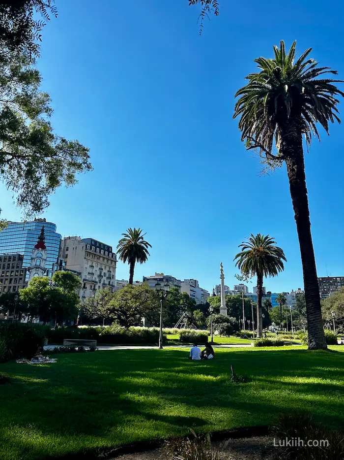 European-style buildings with palm trees.